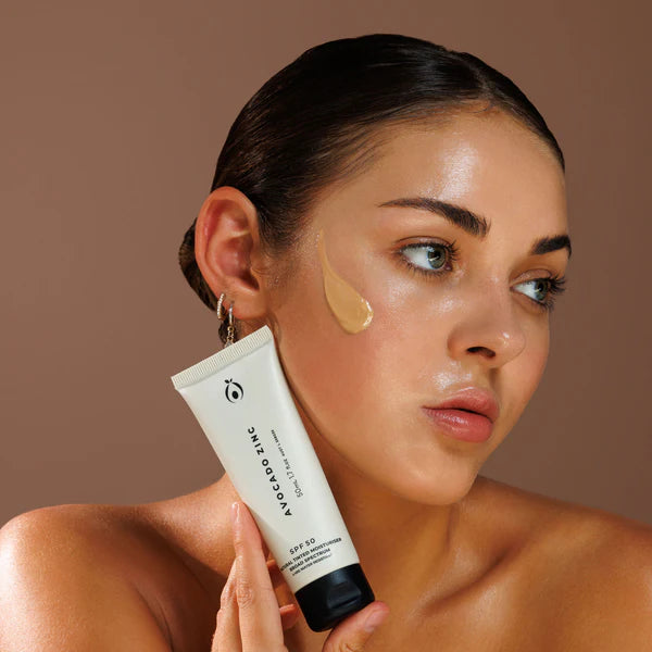 SPF 50 NATURAL TINTED MOISTURISER - LIGHT/MEDIUM